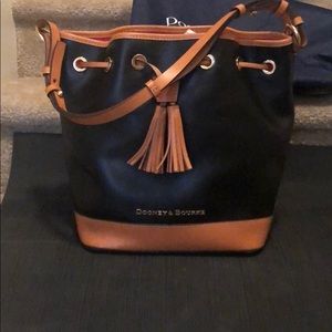 Dooney and Bourke leather bucket bag with tassel